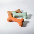 Dog chewing bone